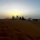 Imagen de clientes de 1001 Tours Morocco en una duna al atardecer