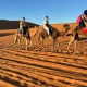 Clientes de 1001 Tours Morocco en paseo con camello por las dunas